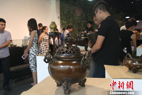 Chinanews. Com: Craft works of master Chen Qiaosheng displayed in Beijing, propagating Xuande furnace culture 